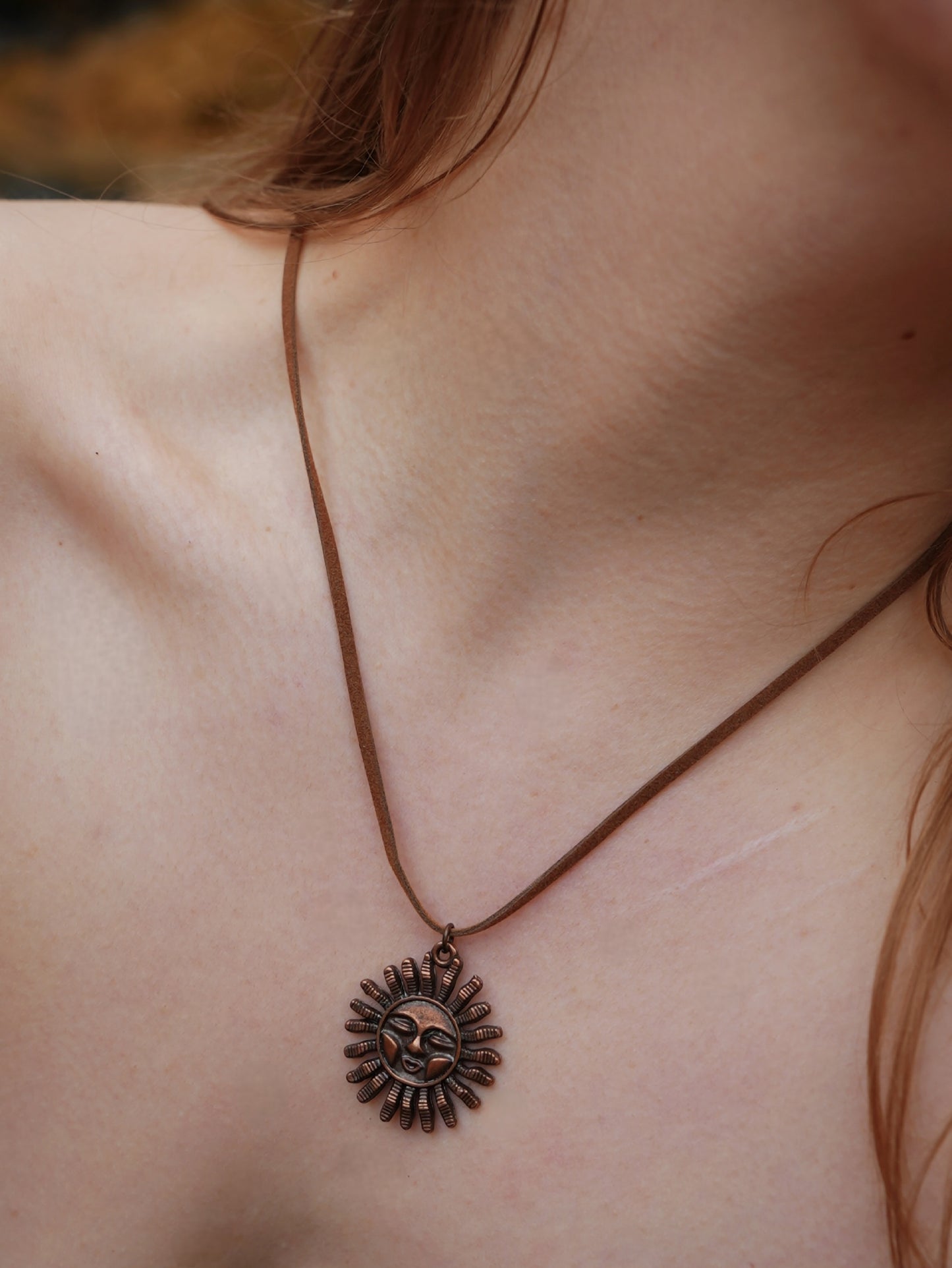 A Ghrian Bronze Sun Necklace