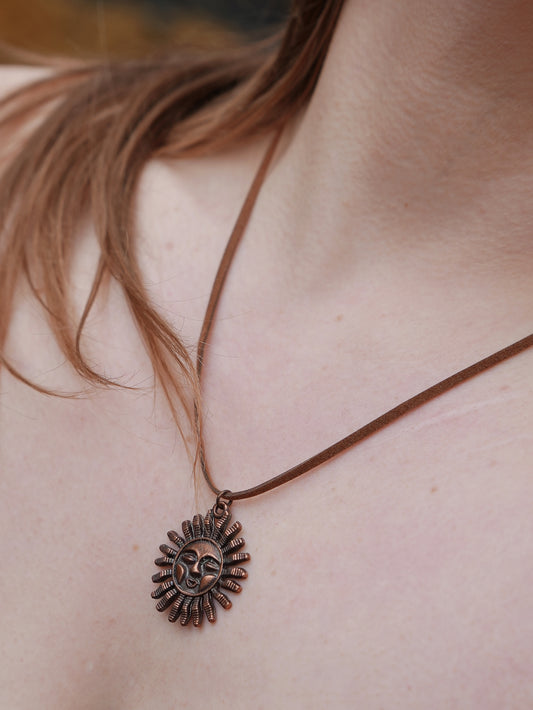 A Ghrian Bronze Sun Necklace