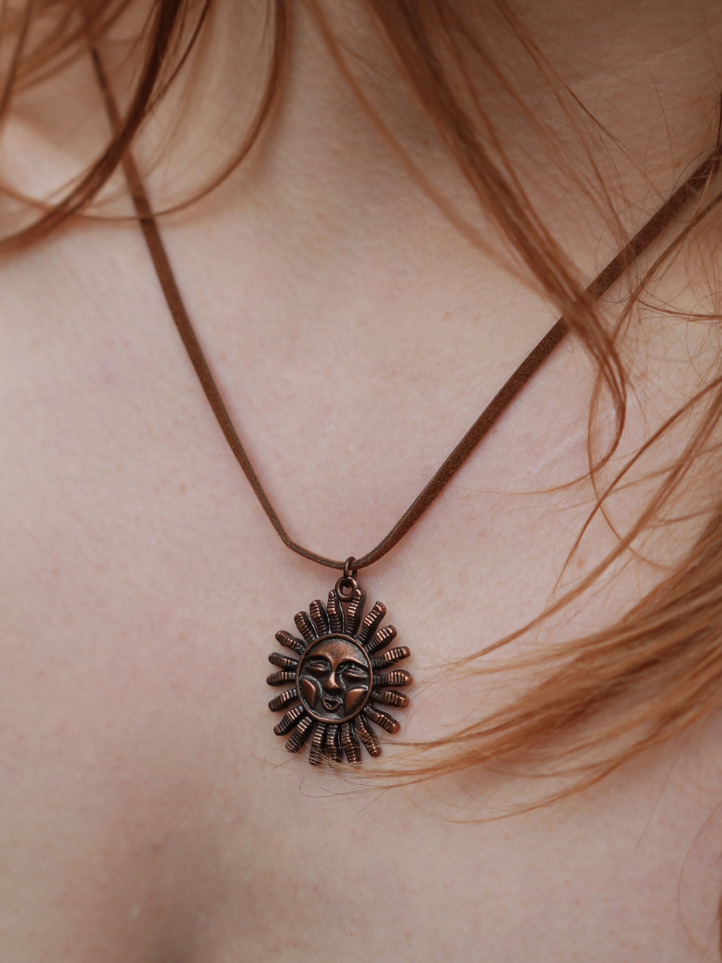 A Ghrian Bronze Sun Necklace