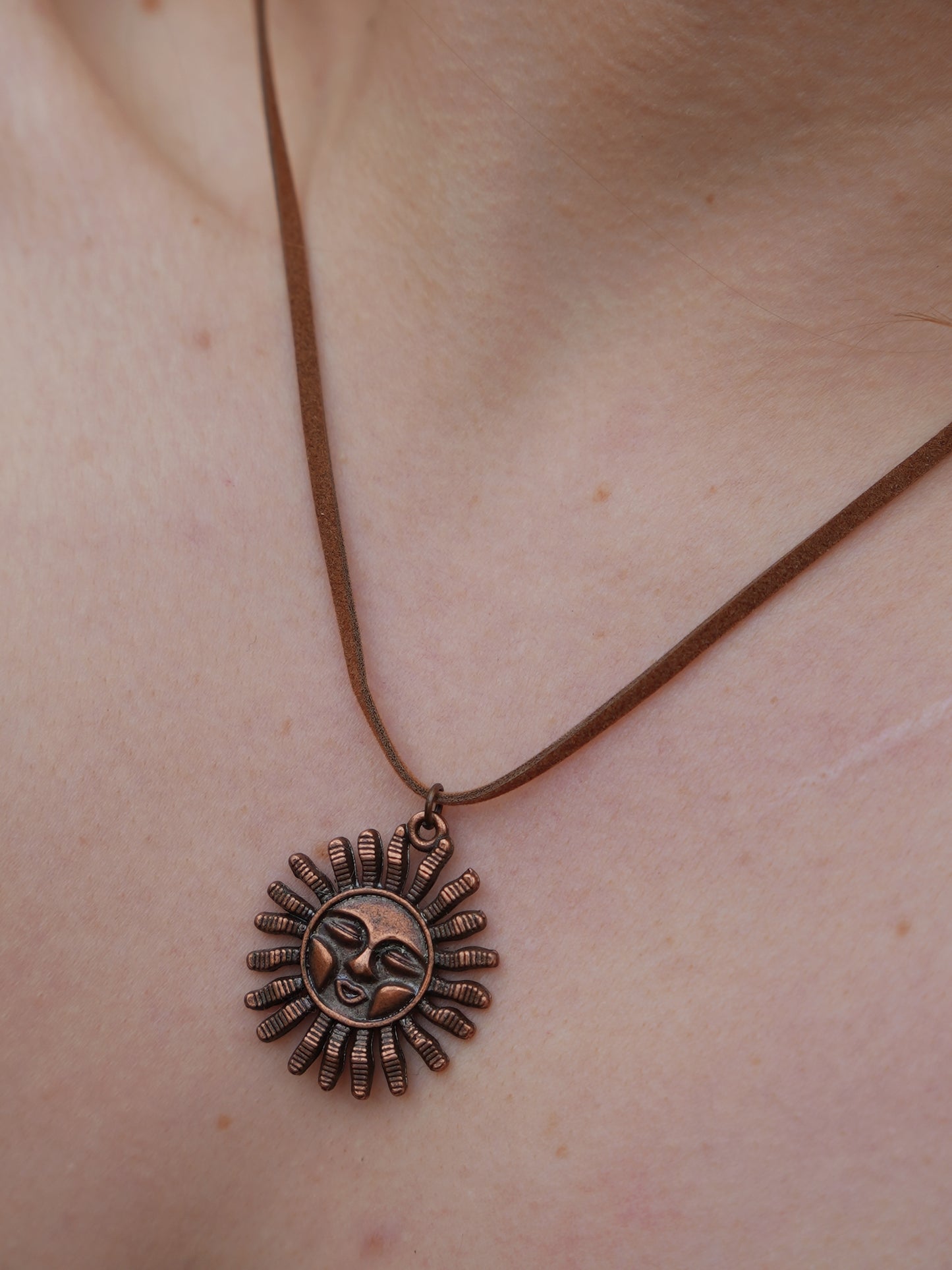 A Ghrian Bronze Sun Necklace